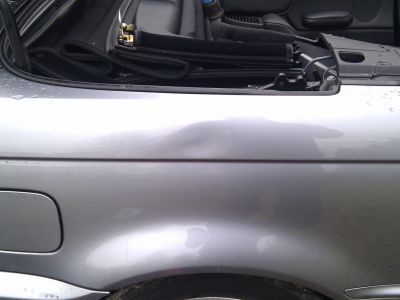 BMW rear wing damage..jpg